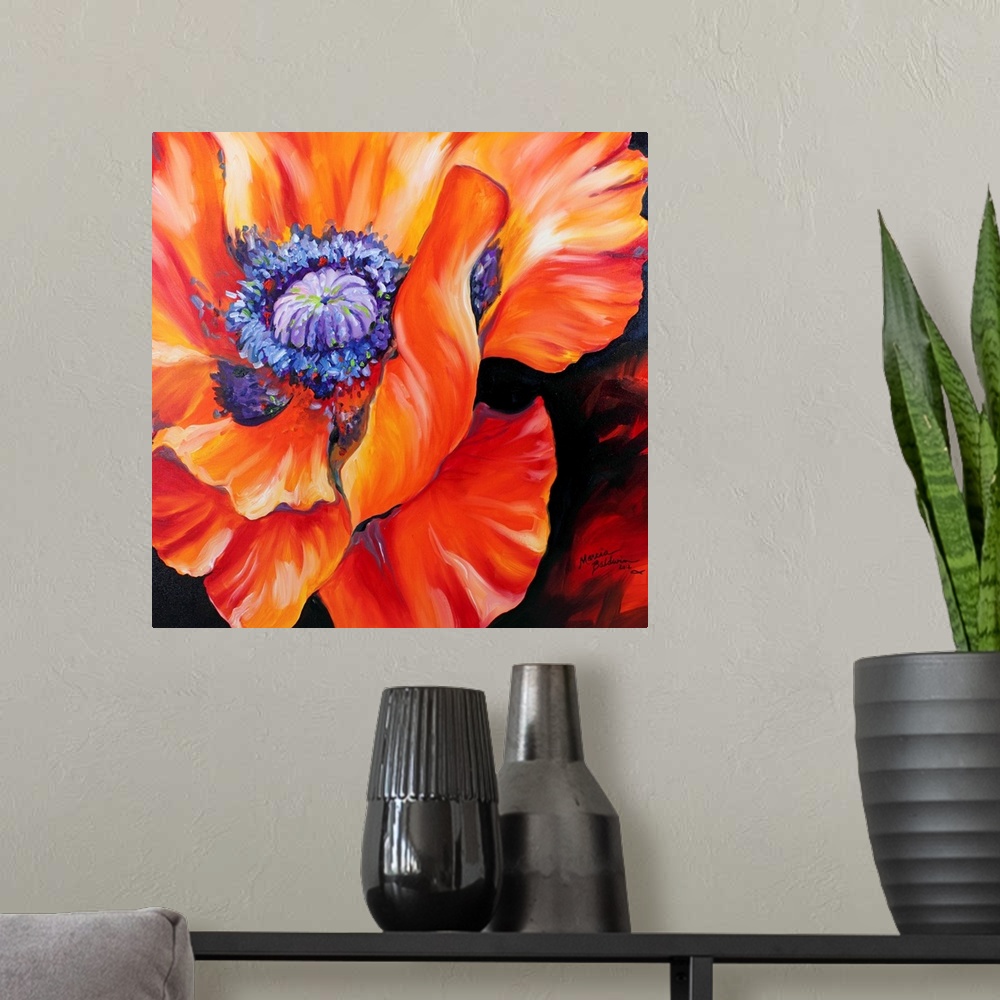 A modern room featuring A floral abstract of a red poppy on a square canvas.