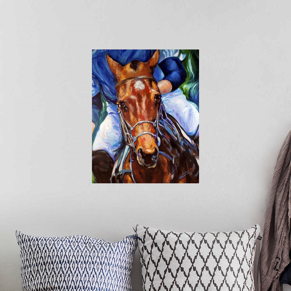 A bohemian room featuring Contemporary painting of a polo horse in action with a rider in blue on its back.