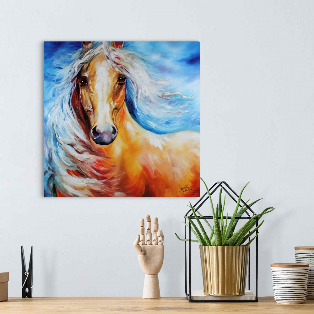 A bohemian room featuring Painting of a horse with a white flowing mane on a square blue background.