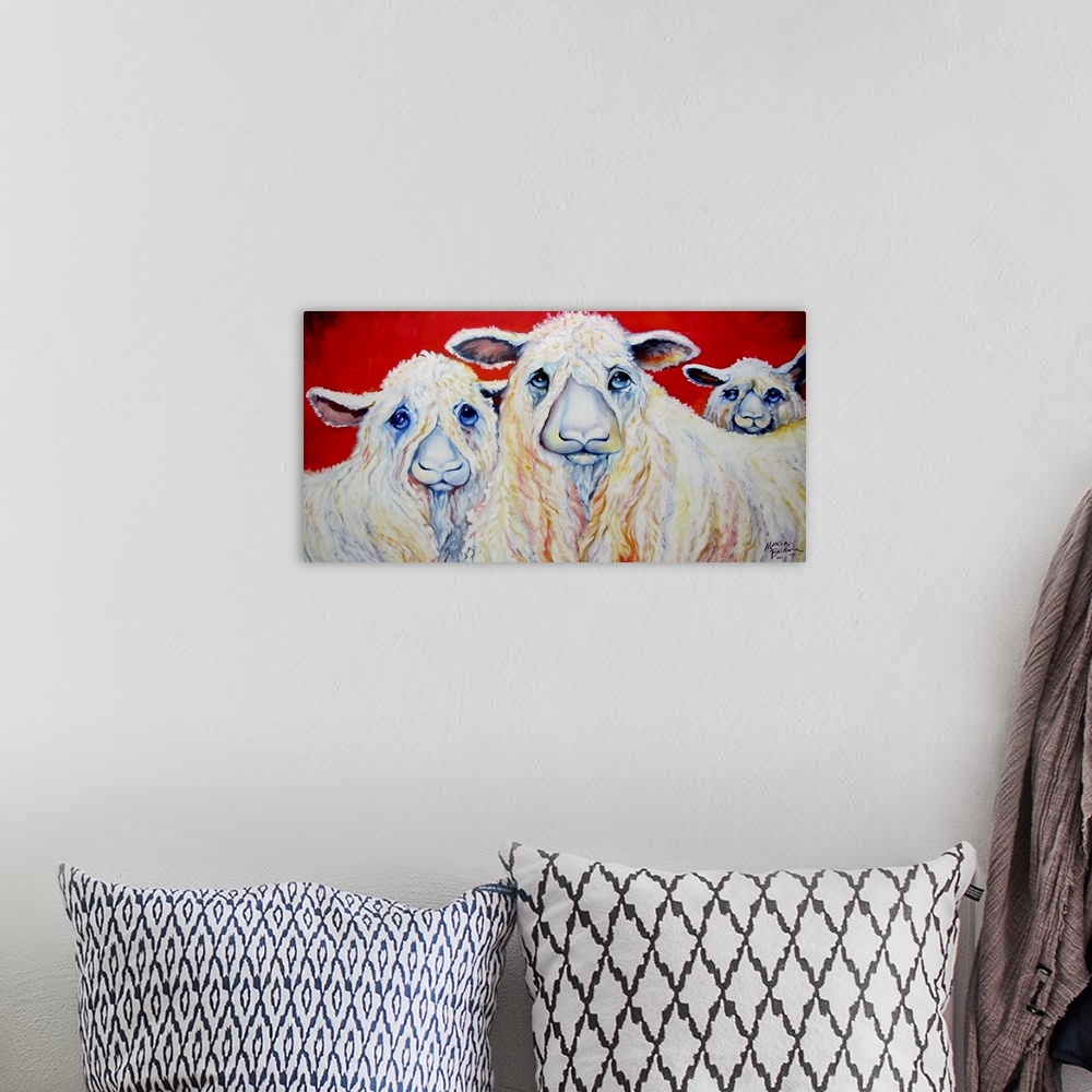 A bohemian room featuring Contemporary painting of three sheep with sad eyes on a red background.