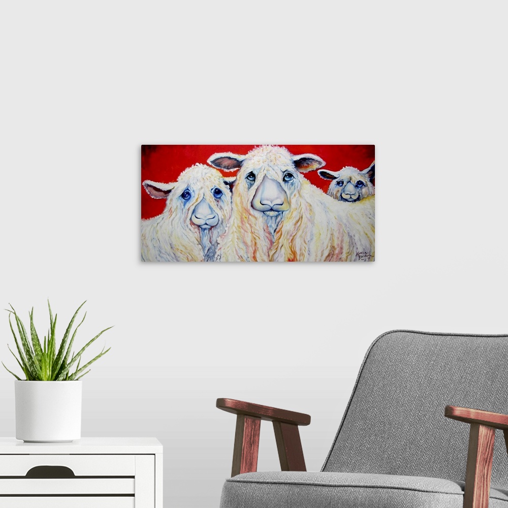 A modern room featuring Contemporary painting of three sheep with sad eyes on a red background.