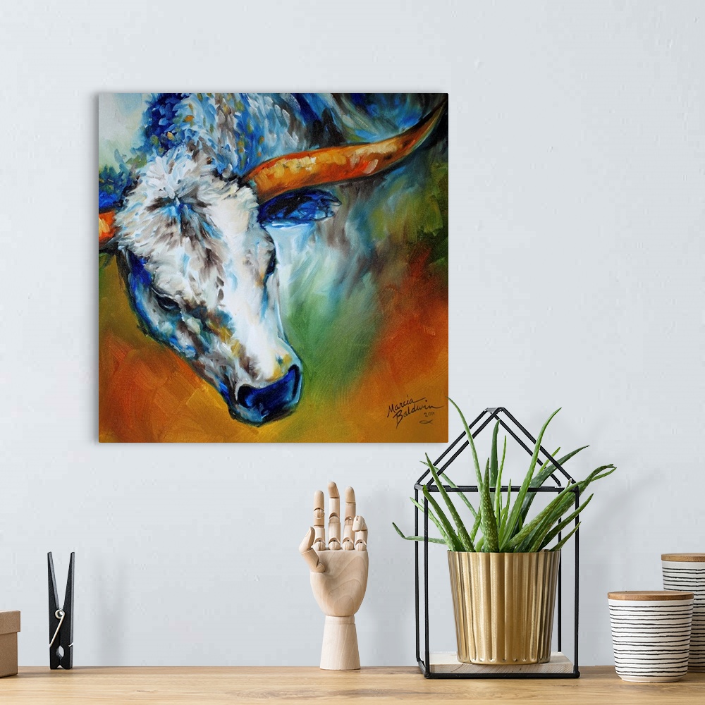 A bohemian room featuring Square abstract painting depicting the magnificent Texas Longhorn.
