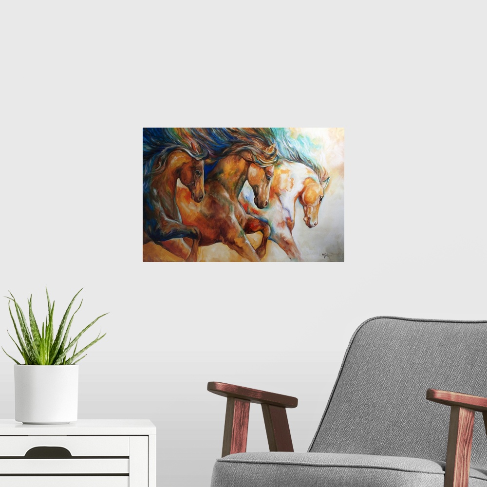 A modern room featuring Contemporary painting of three horses galloping in action with their mane's flowing.