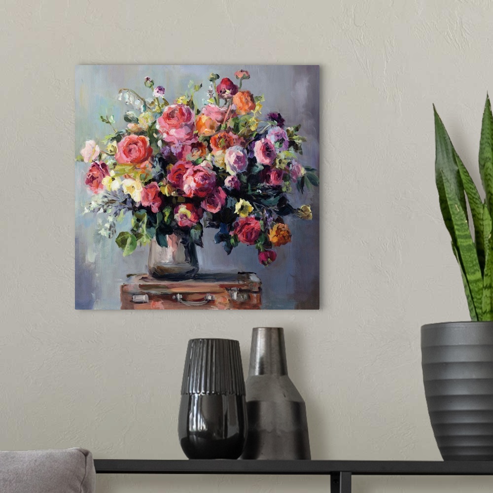 A modern room featuring Contemporary still-life painting of a bouquet of colorful flowers.