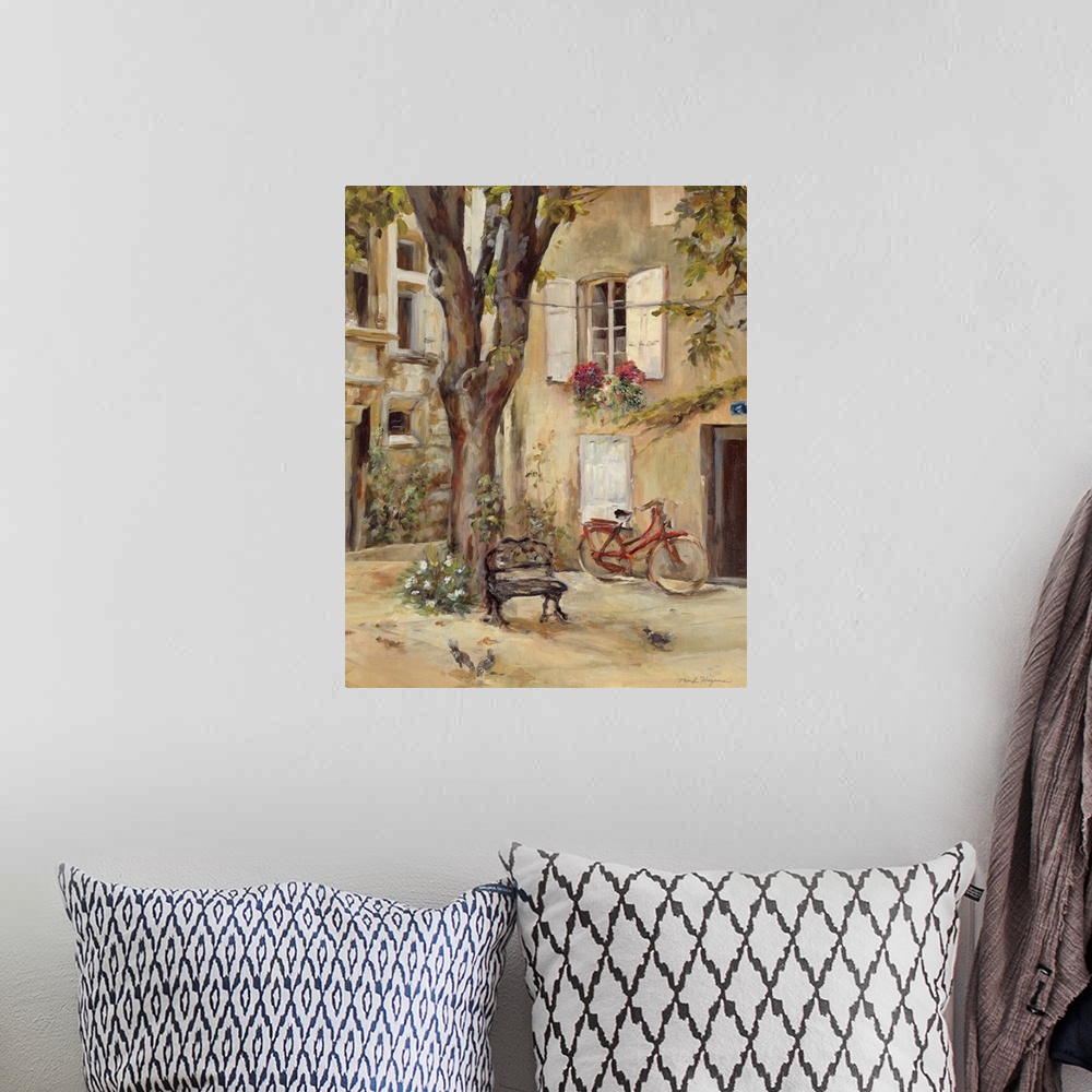 A bohemian room featuring Painting of building courtyard with huge tree growing in center.  The building is covered with wi...