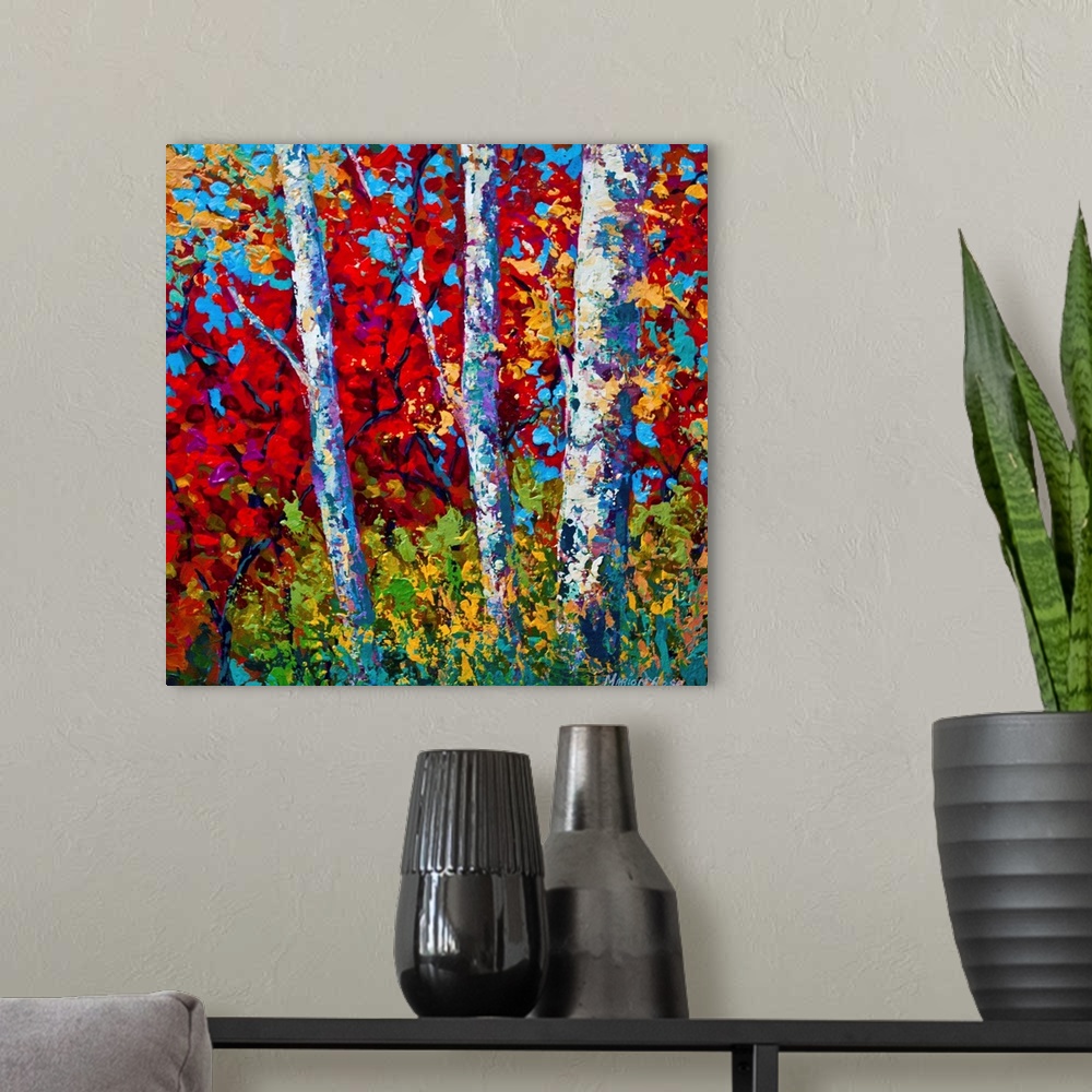 A modern room featuring Contemporary painting by Marion Rose of three trees with bright autumn leaves on a sunny fall day.