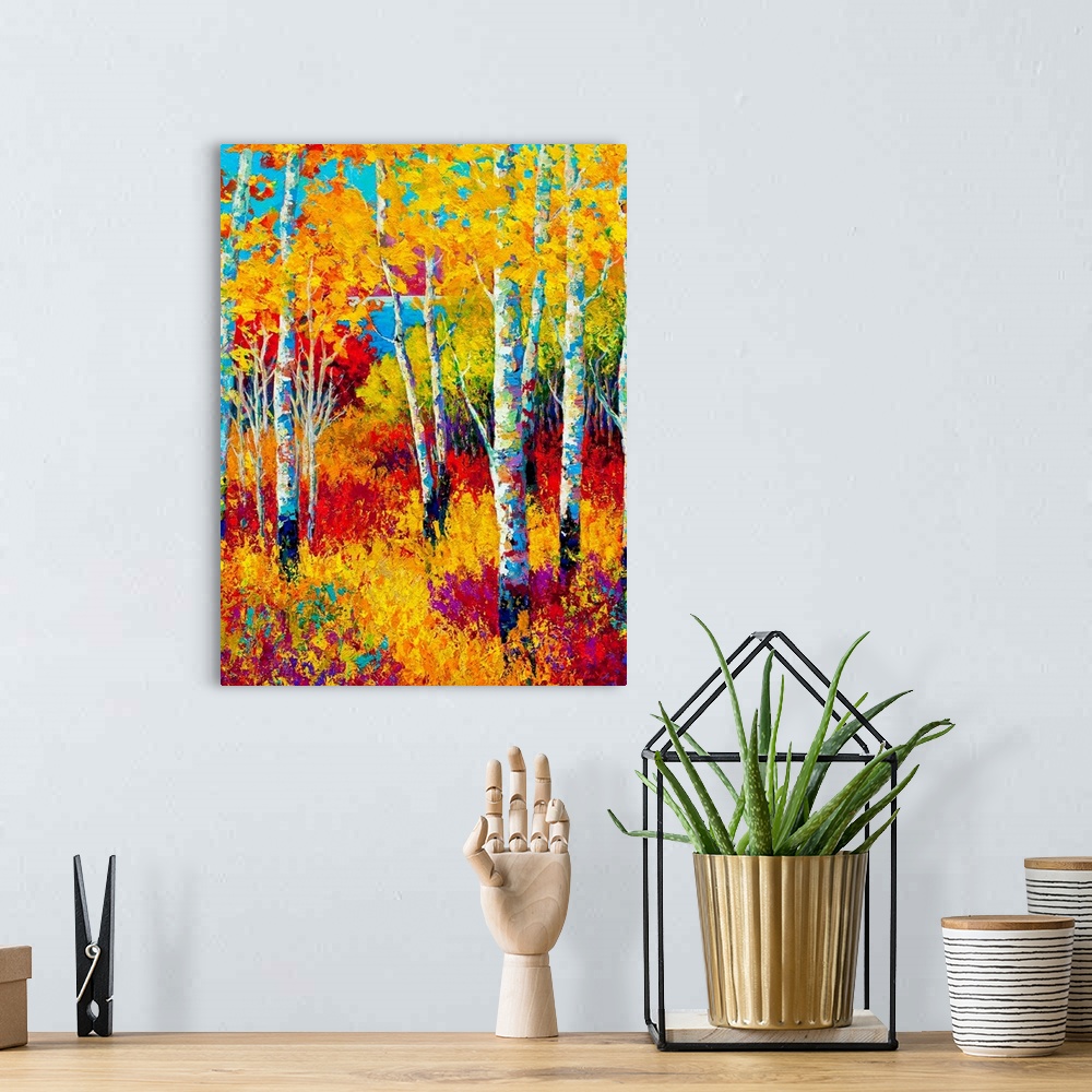A bohemian room featuring Contemporary painting of colorful fall forest with undergrowth.