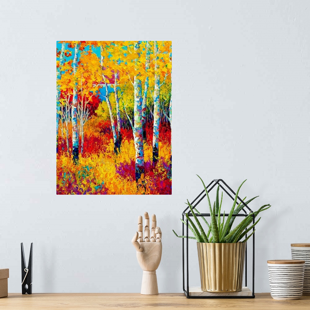 A bohemian room featuring Contemporary painting of colorful fall forest with undergrowth.