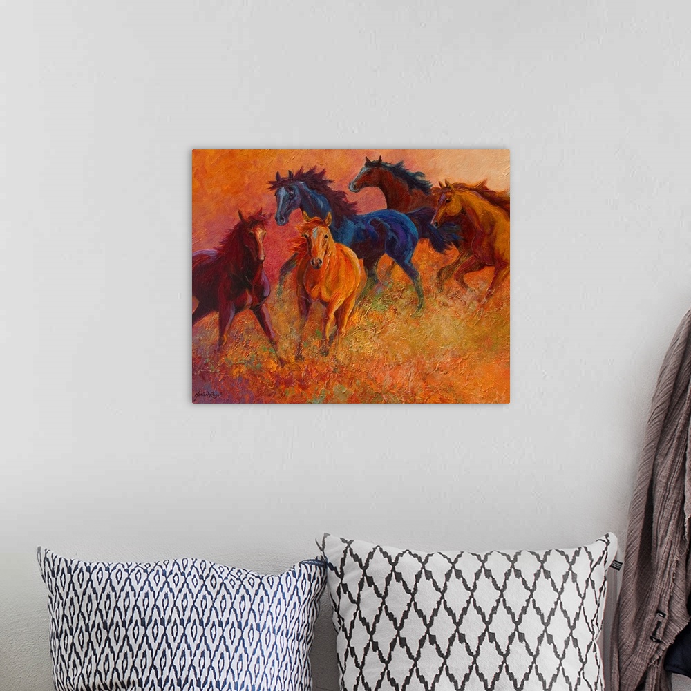 A bohemian room featuring Large contemporary art displays a group of five horses galloping through an empty field.  Artist ...