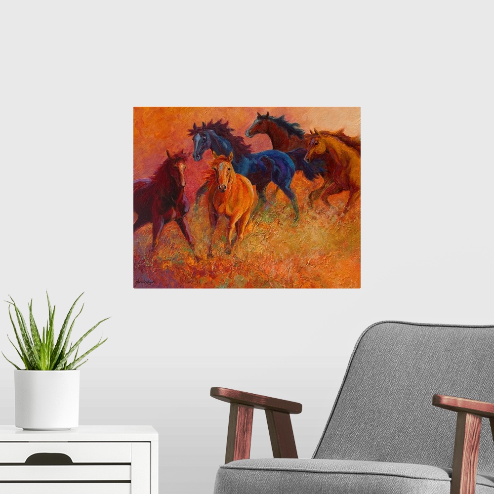 A modern room featuring Large contemporary art displays a group of five horses galloping through an empty field.  Artist ...