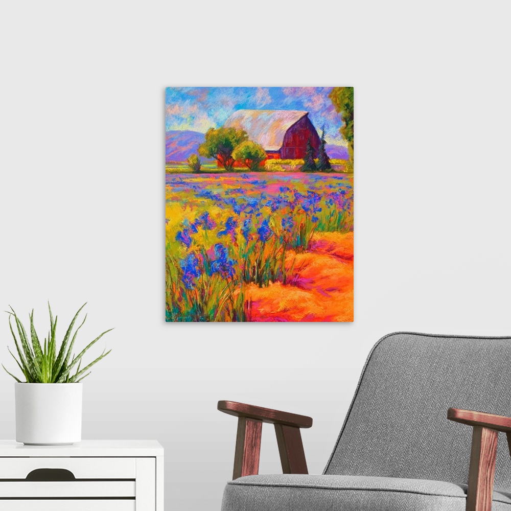 A modern room featuring Portrait, oversized wall painting of a large field of Iris flowers, with a large barn surrounded ...