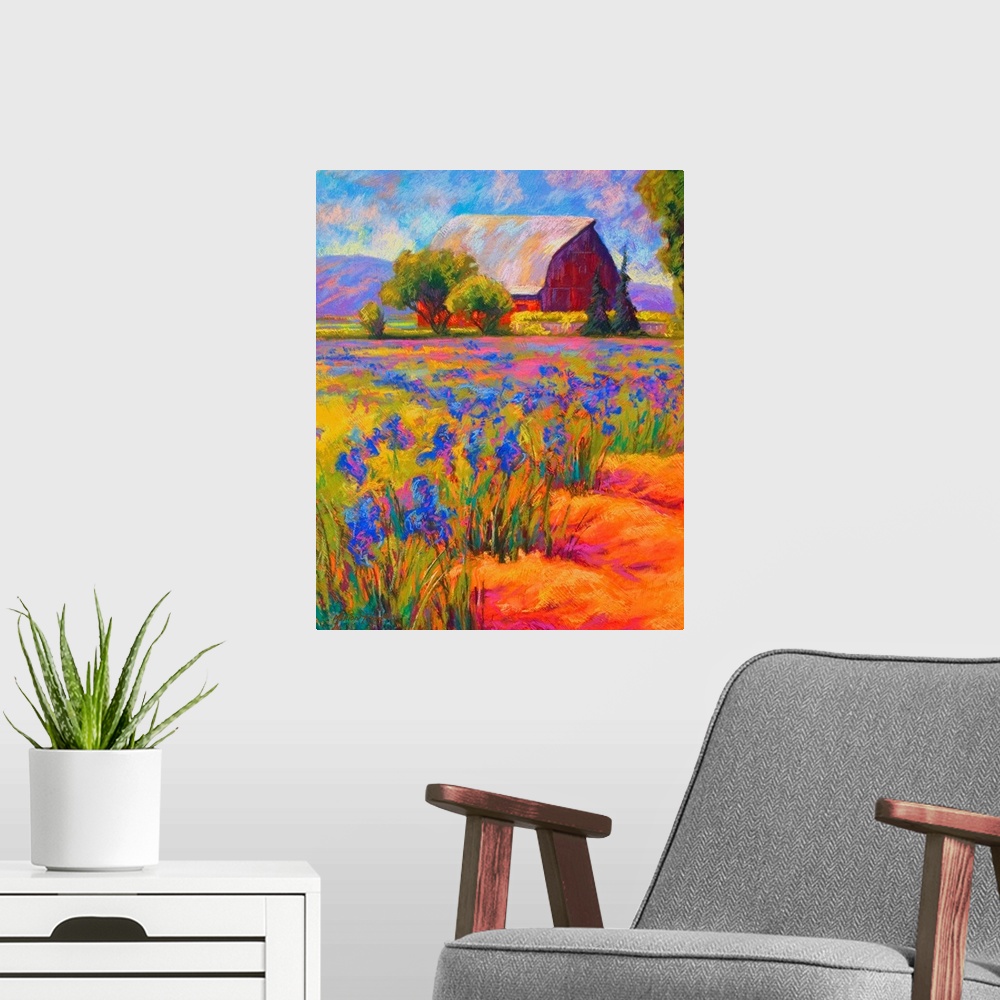 A modern room featuring Portrait, oversized wall painting of a large field of Iris flowers, with a large barn surrounded ...