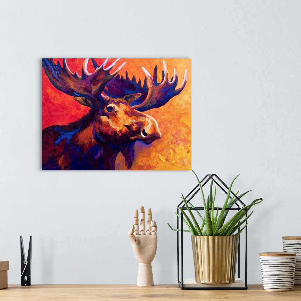 A bohemian room featuring Several colors are used to paint the upper body of a large moose that is surrounded by warm tones.