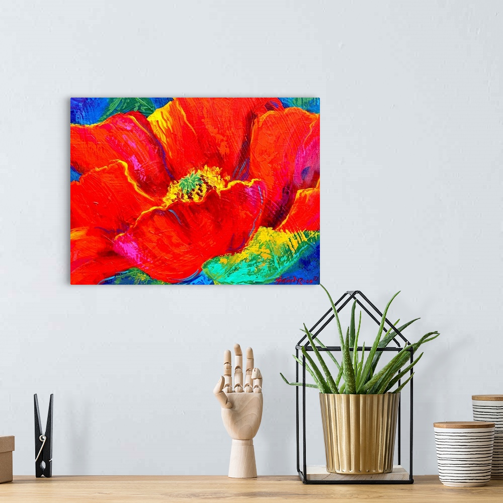 A bohemian room featuring Up-close painting of boldly colored flower.