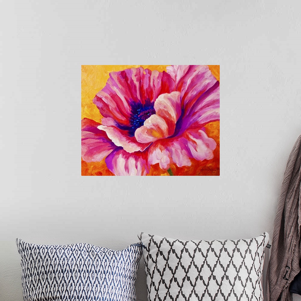 A bohemian room featuring Contemporary floral painting of a giant blooming pink poppy flower on a bright, textured background.