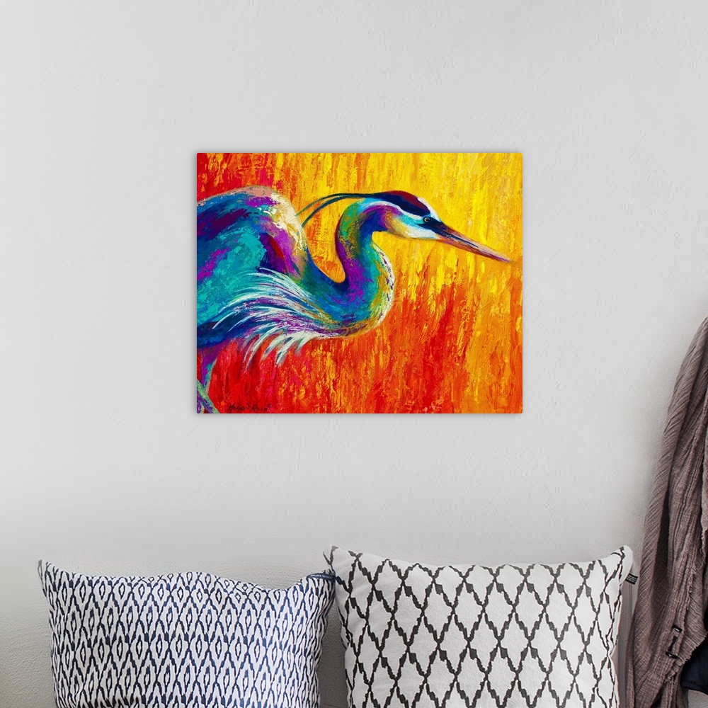 A bohemian room featuring Contemporary art painting of a bright colored egret bird on a firey background.