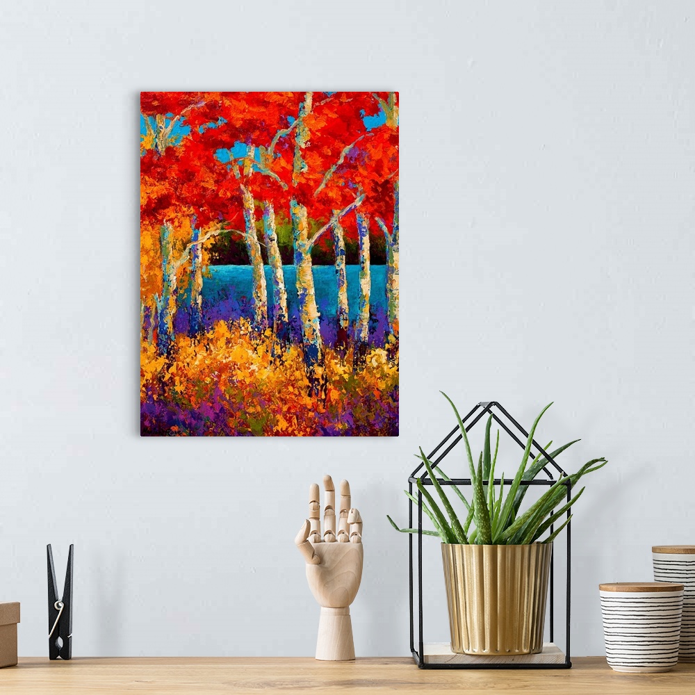 A bohemian room featuring Vertical abstract painting of a forest made up of bright colors.