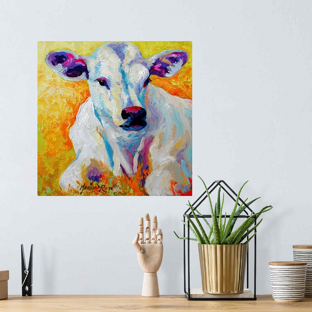 A bohemian room featuring Contemporary painting of a young cow with soulful eyes and large ears, its white body standing ou...
