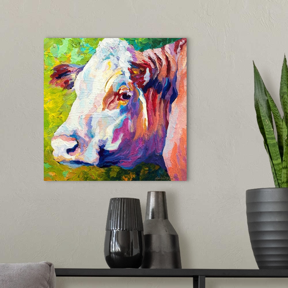 A modern room featuring A portrait of a cow is painted as it turns its head to look backward.