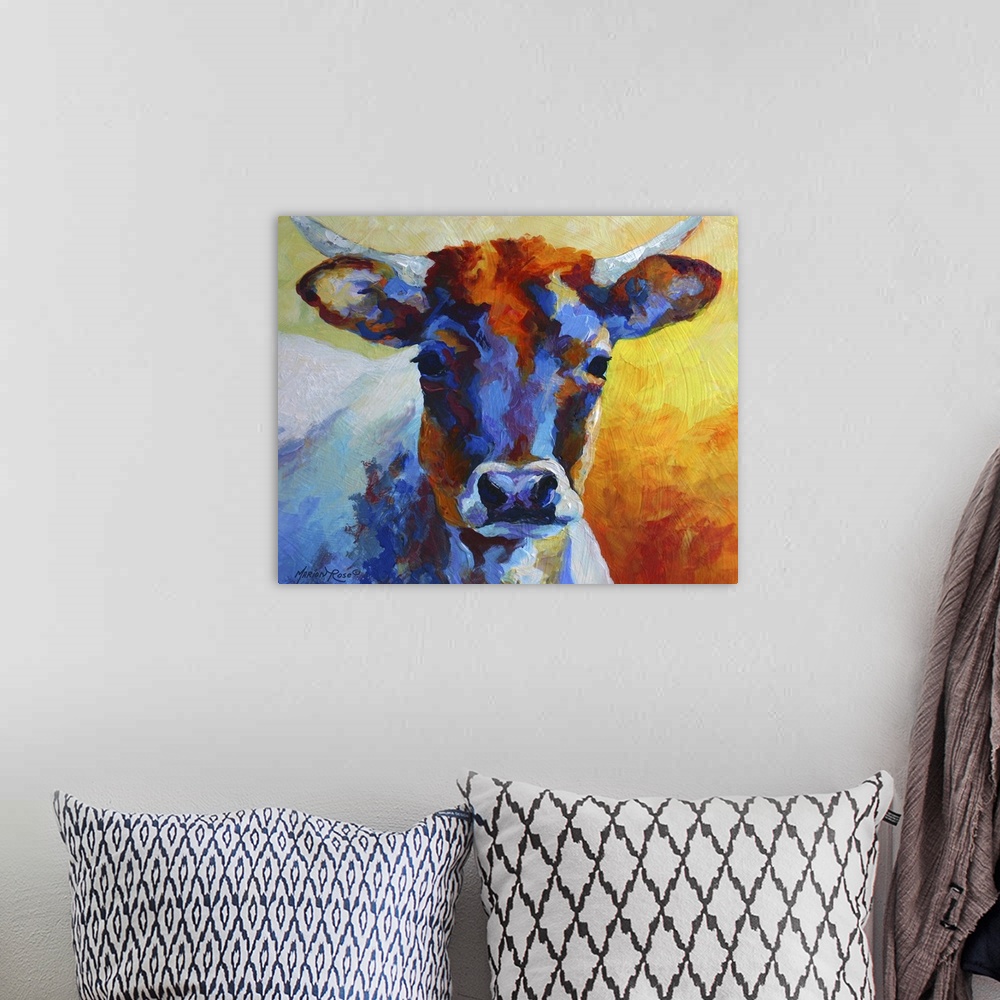 A bohemian room featuring Various colors are used to paint a portrait of a young cow.