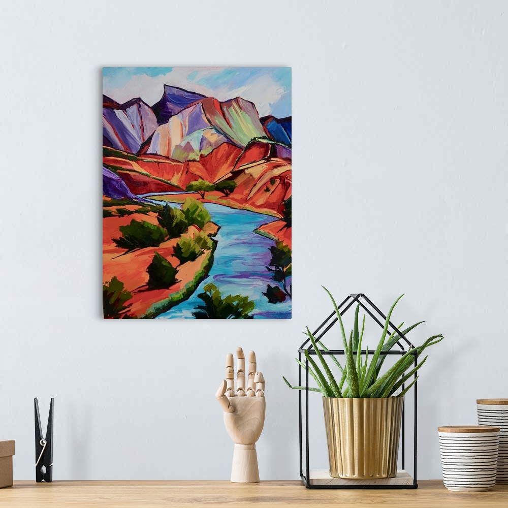 A bohemian room featuring Chama River in Southwest winding through mountains.