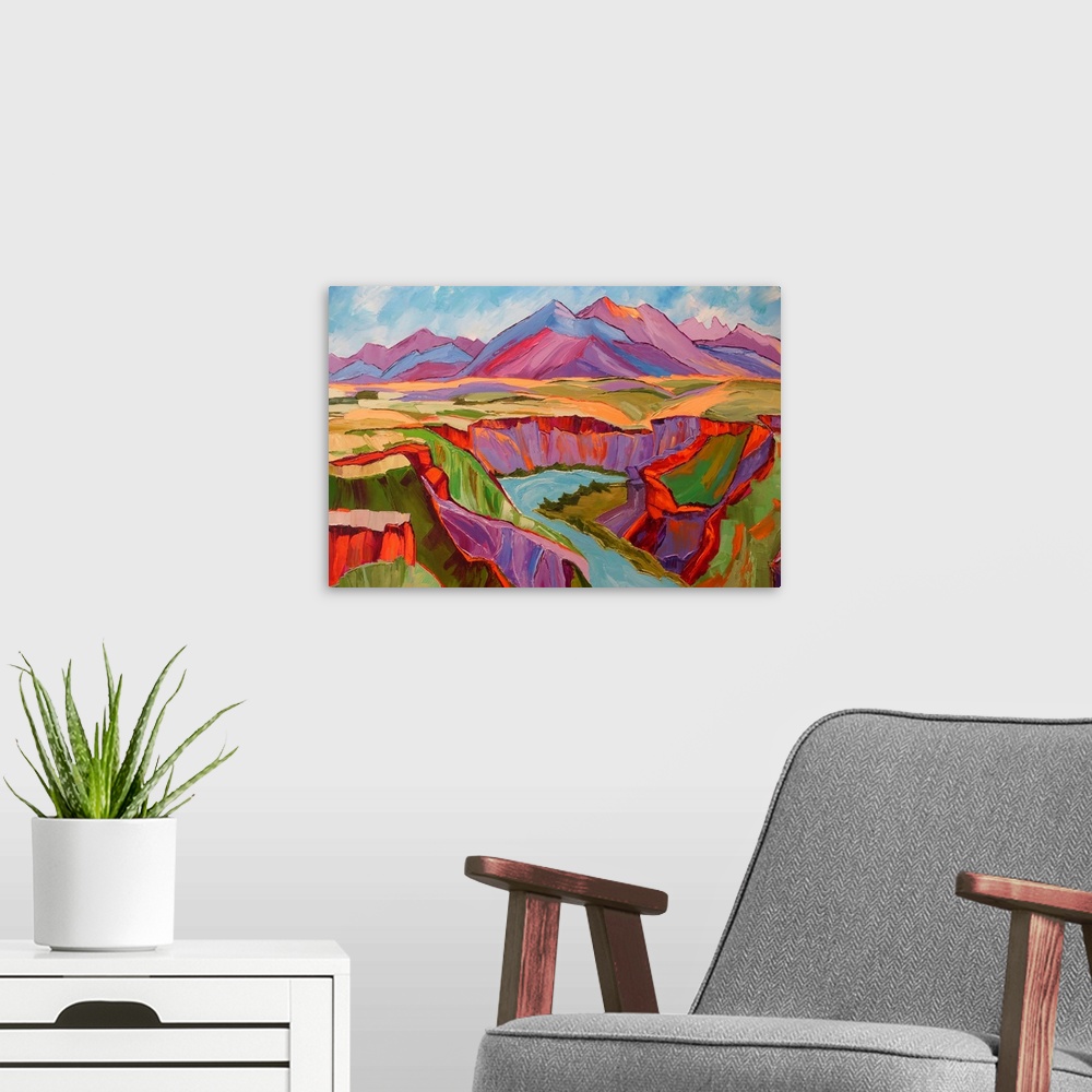 A modern room featuring View of Southwest with mountains, river, and cliffs in vivid color.