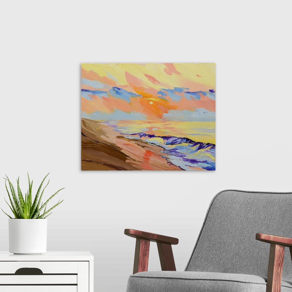 A modern room featuring Sunset over the ocean with tide and dunes.