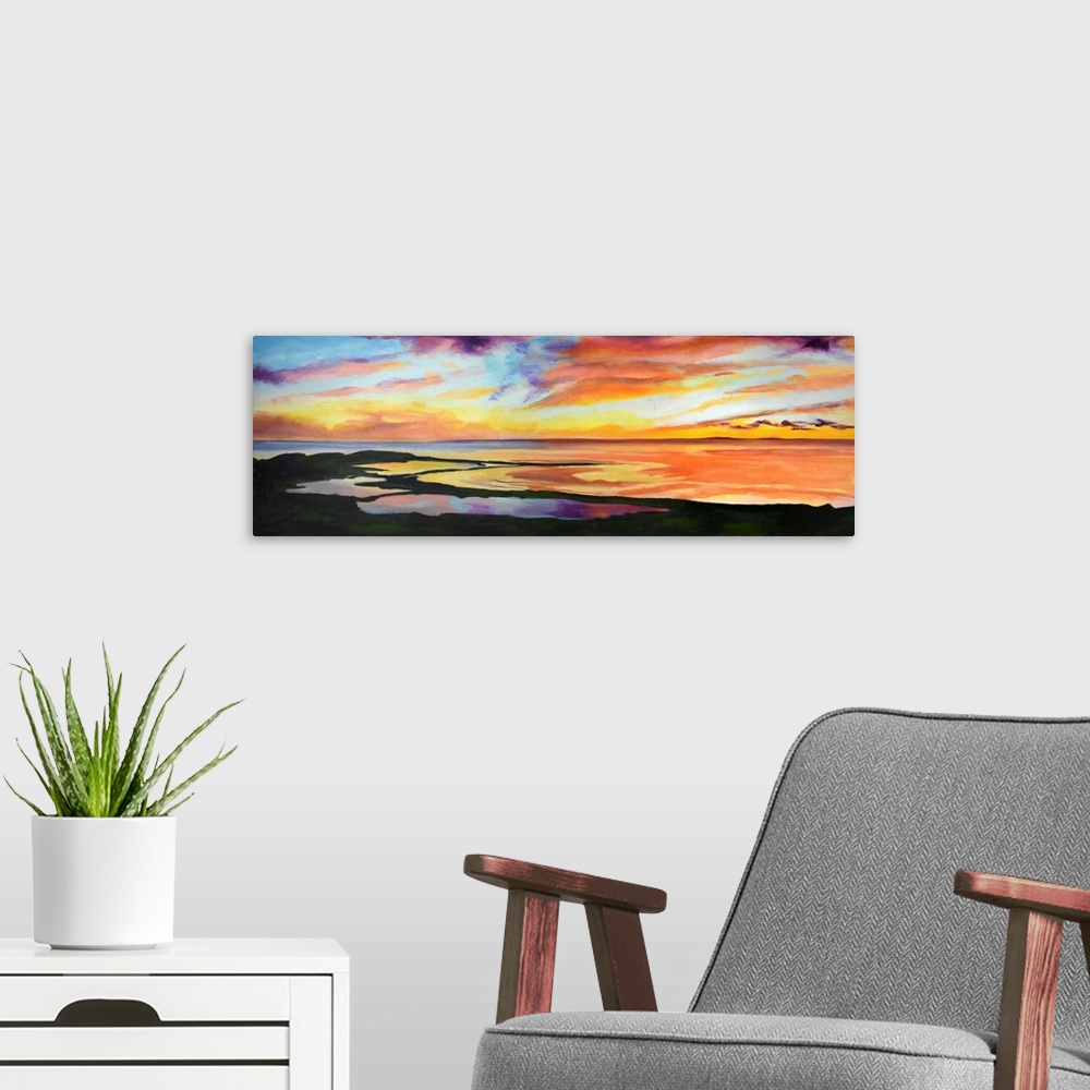 A modern room featuring Coastal scene with golden sky and reflections in the water.