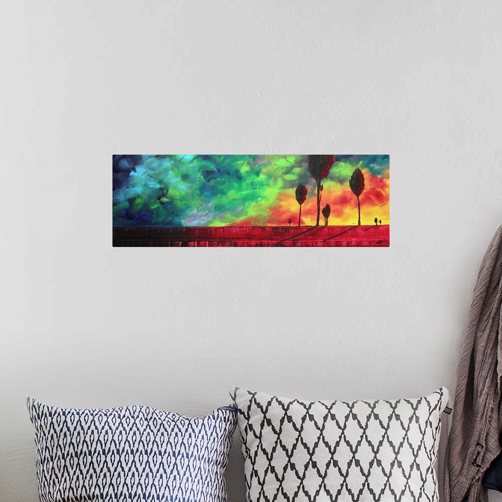 A bohemian room featuring Contemporary abstract painting of trees silhouetted against a brightly colored sky made up of bro...