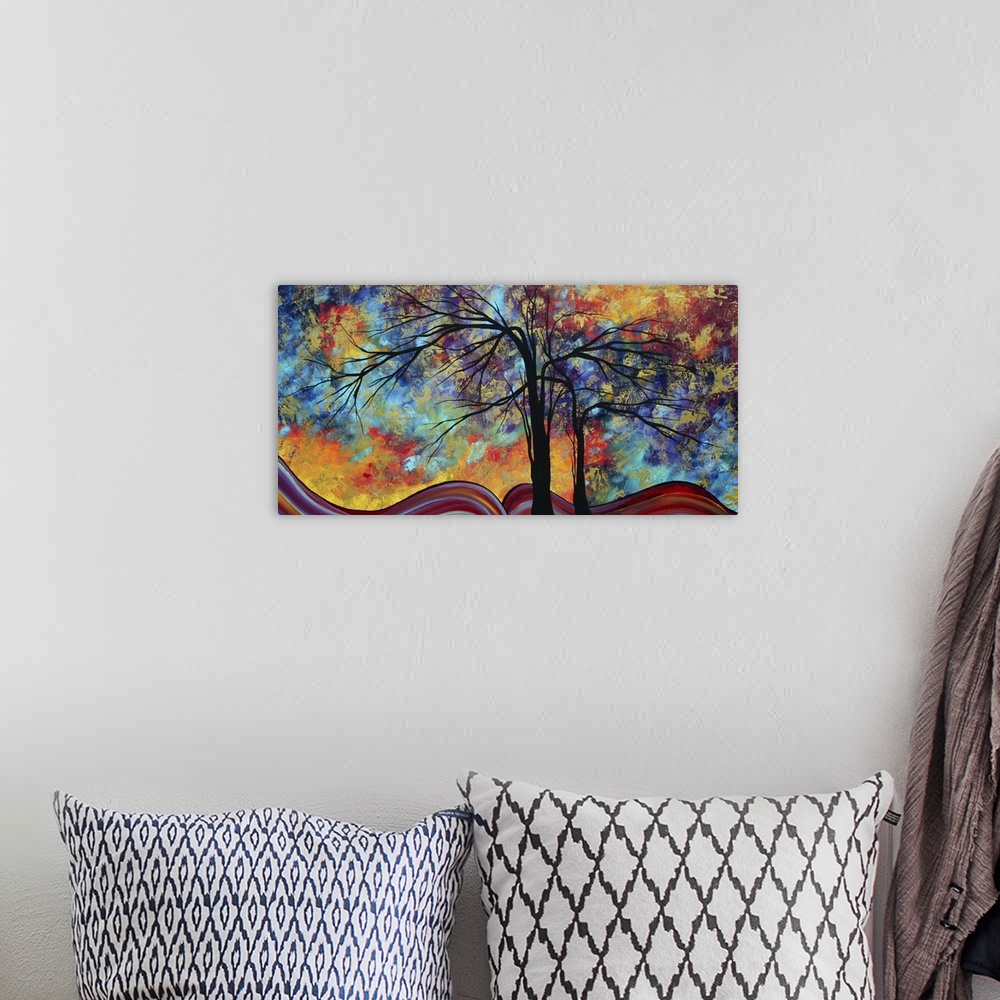 A bohemian room featuring Contemporary painting with the silhouettes of trees against a bright sponged background with swir...