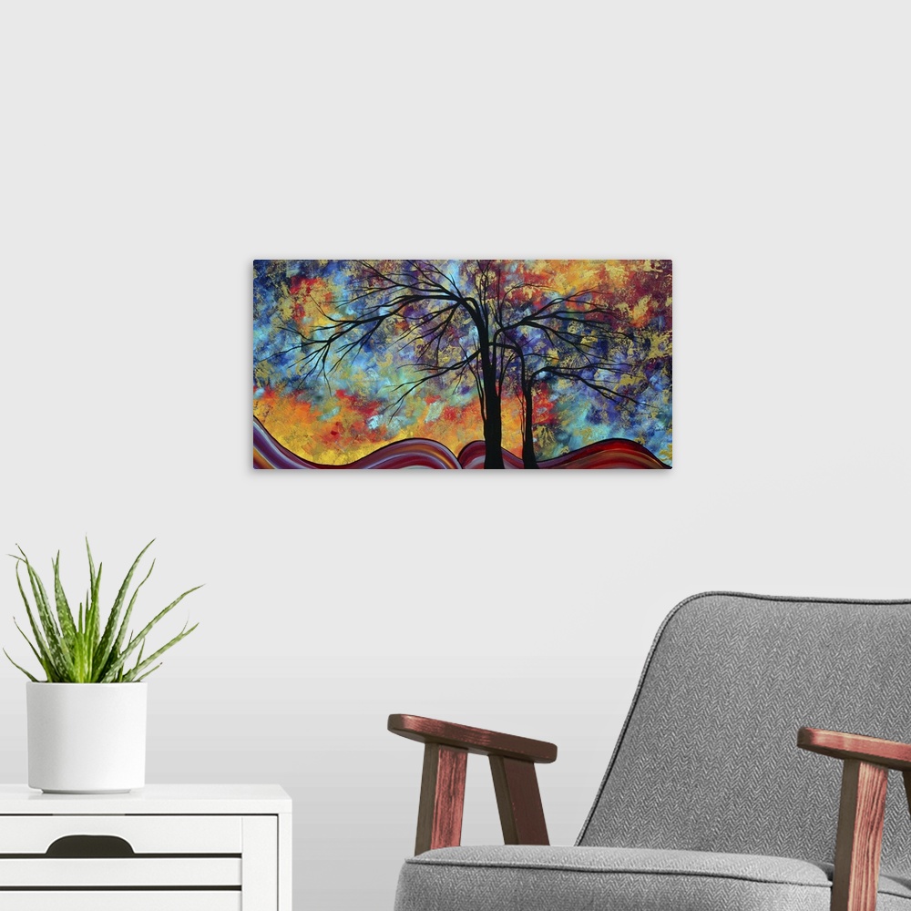 A modern room featuring Contemporary painting with the silhouettes of trees against a bright sponged background with swir...