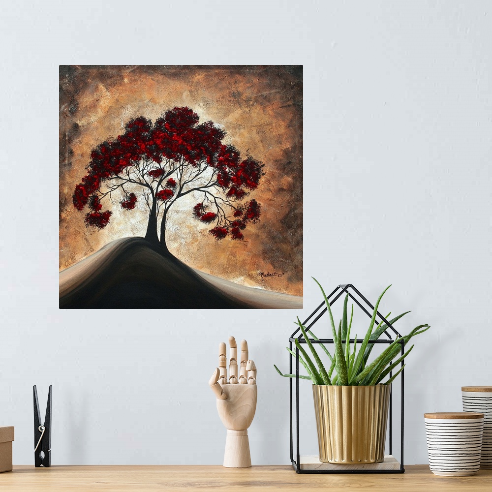 A bohemian room featuring Contemporary painting of a tree with many branches and bright red leaves on a single hill with a ...