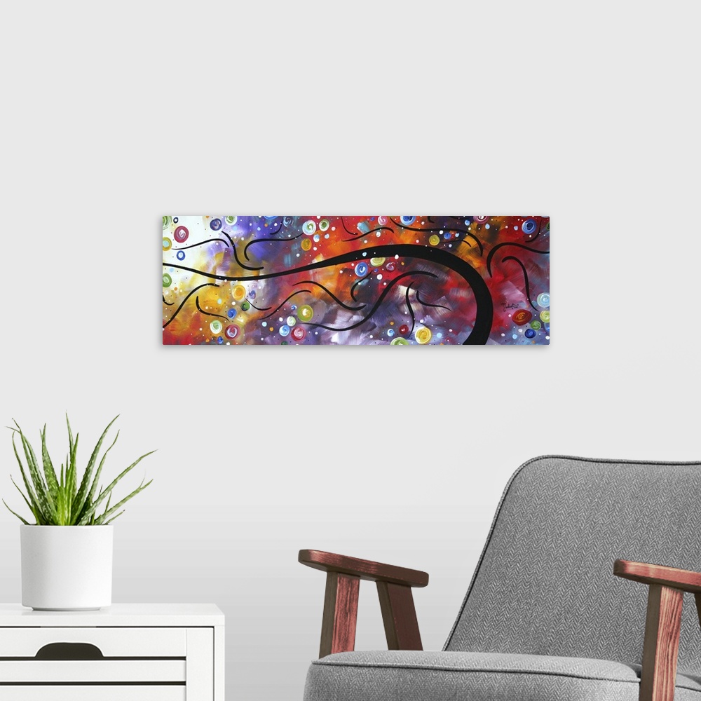 A modern room featuring This is a panoramic shaped painting of a blend of colors and shapes with a dark silhouetted shape...