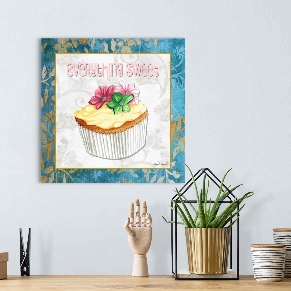 A bohemian room featuring A square panel featuring a cupcake decorated with three flowers and vanilla frosting.