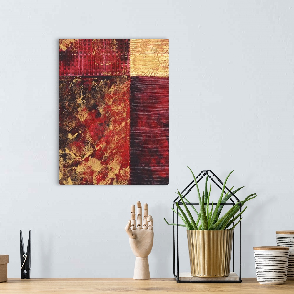 A bohemian room featuring Contemporary abstract painting using gold and red tones in geometric forms.