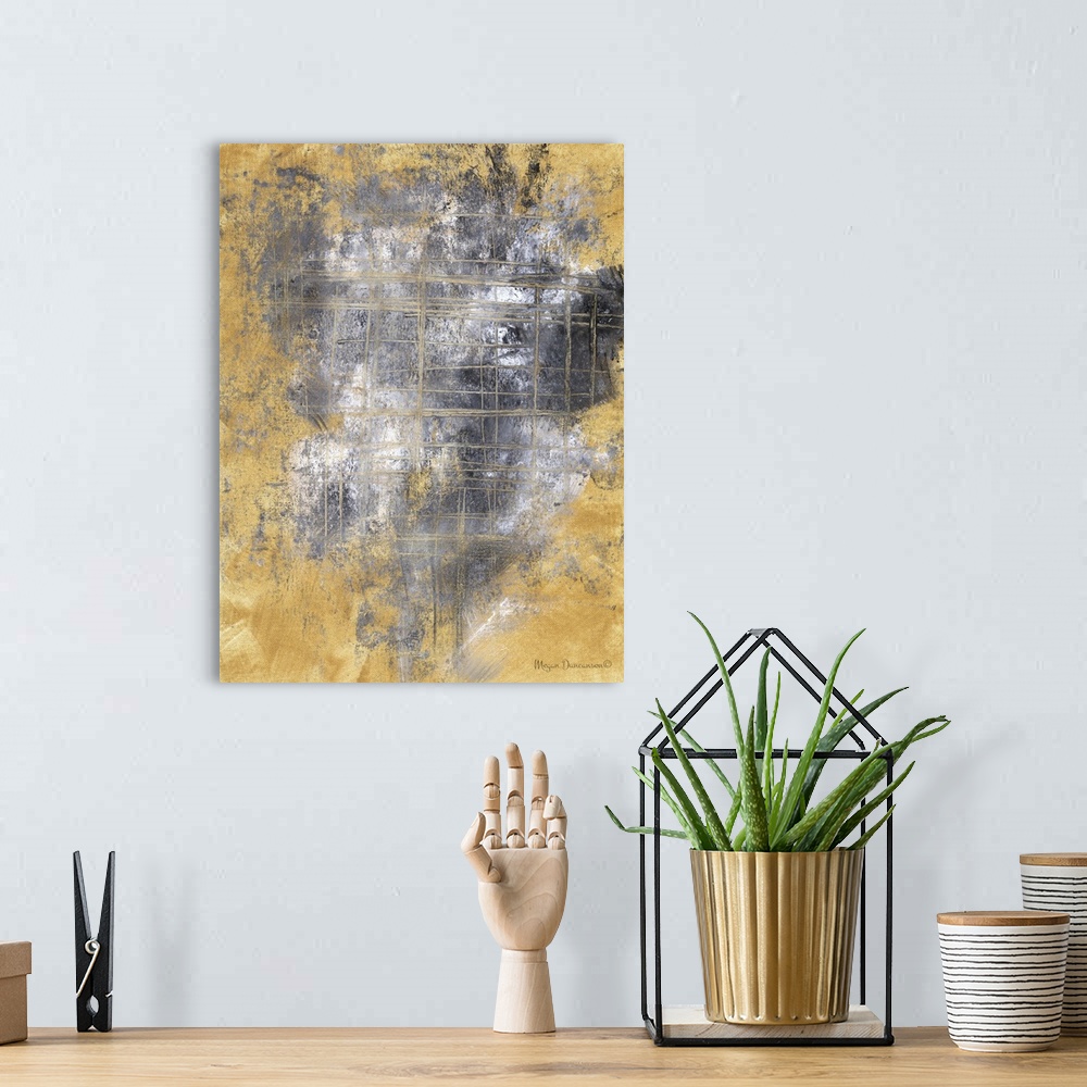 A bohemian room featuring A contemporary abstract painting that has a gold background and gray, black and white hues on top...