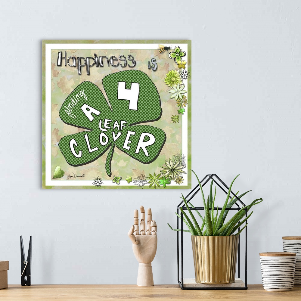 A bohemian room featuring Whimsical artwork of a large lucky clover with illustrated text.
