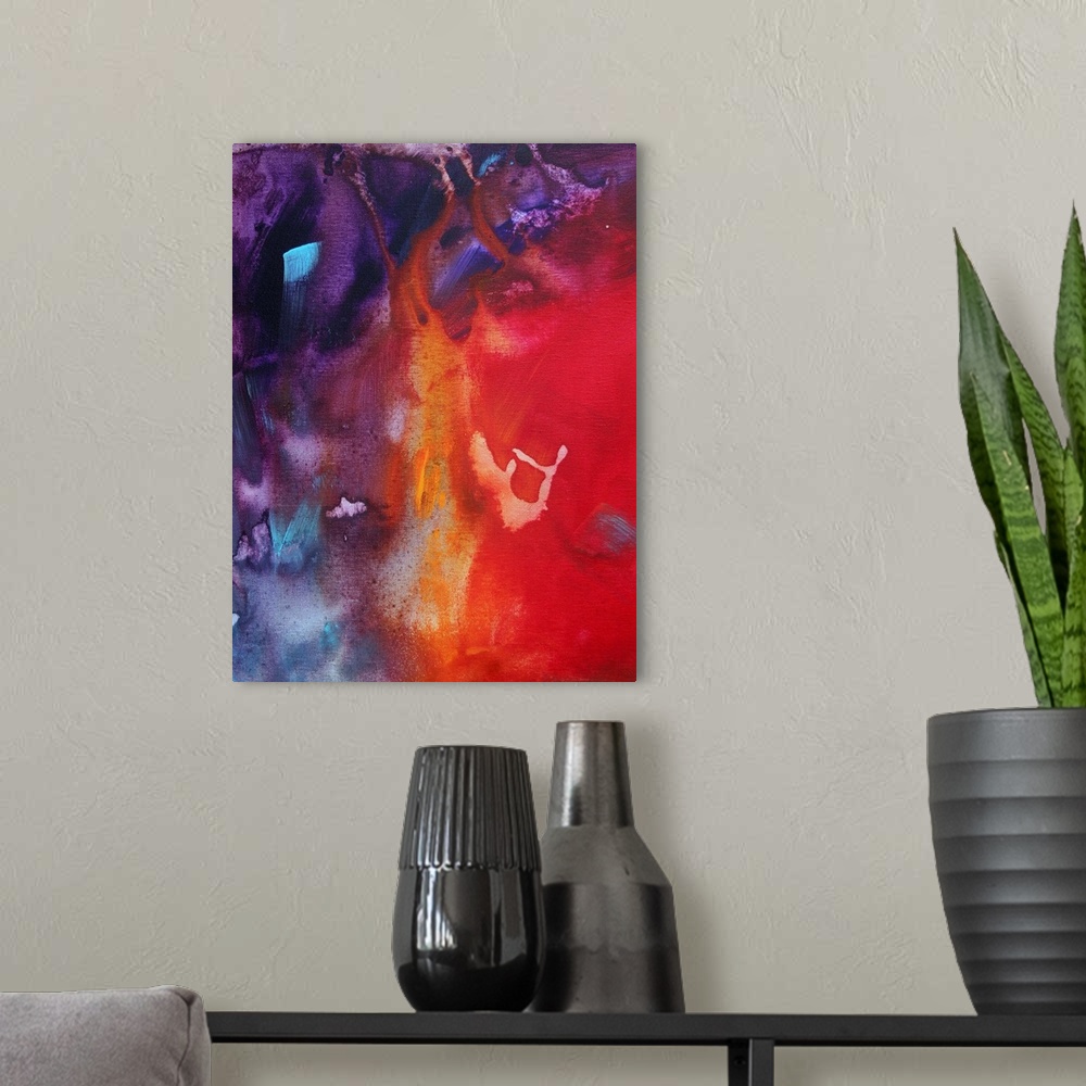 A modern room featuring An Original Abstract painting in MADART's unique contemporary style. The fluid colors of reds, ye...