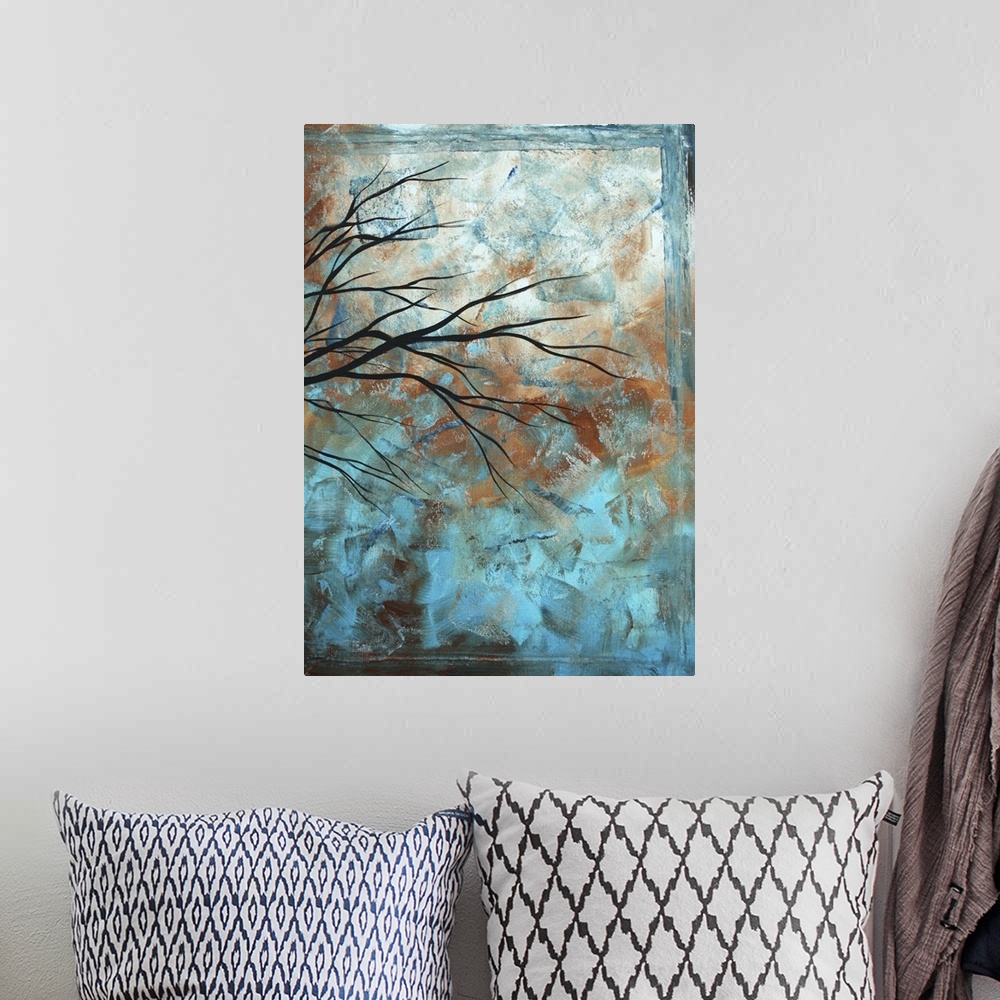 A bohemian room featuring Contemporary abstract painting of tree limbs with leaves against a bright sky.