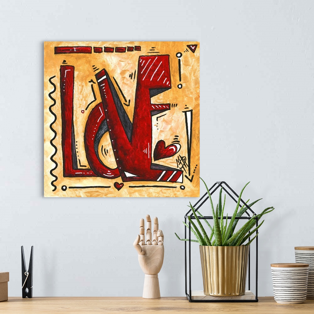A bohemian room featuring Pop art of the word "Love" in red with hearts on a golden background.