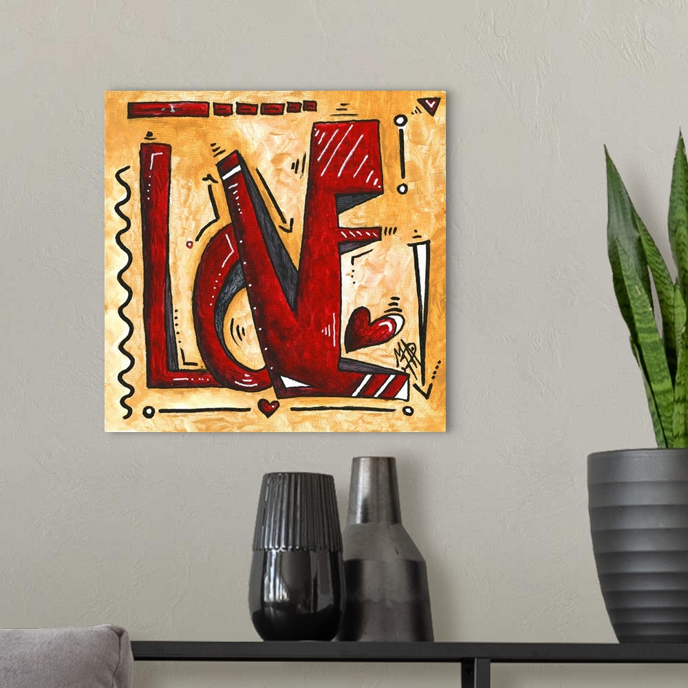 A modern room featuring Pop art of the word "Love" in red with hearts on a golden background.