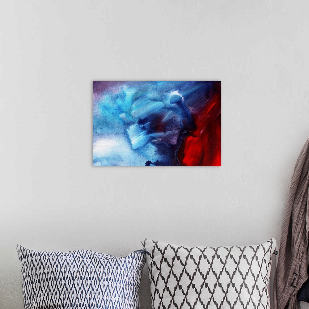 A bohemian room featuring Abstract painting on canvas of warm colors meeting cool colors on canvas.