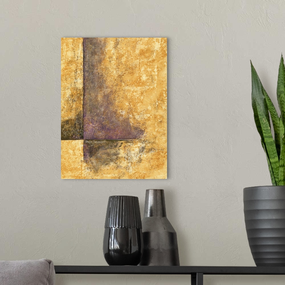 A modern room featuring A contemporary abstract painting that has a gold background with purple and black designs lying h...