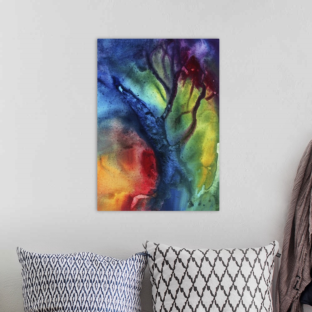 A bohemian room featuring Abstract artwork that has fluid colors of reds, yellows, magenta, violet and blue accented with b...