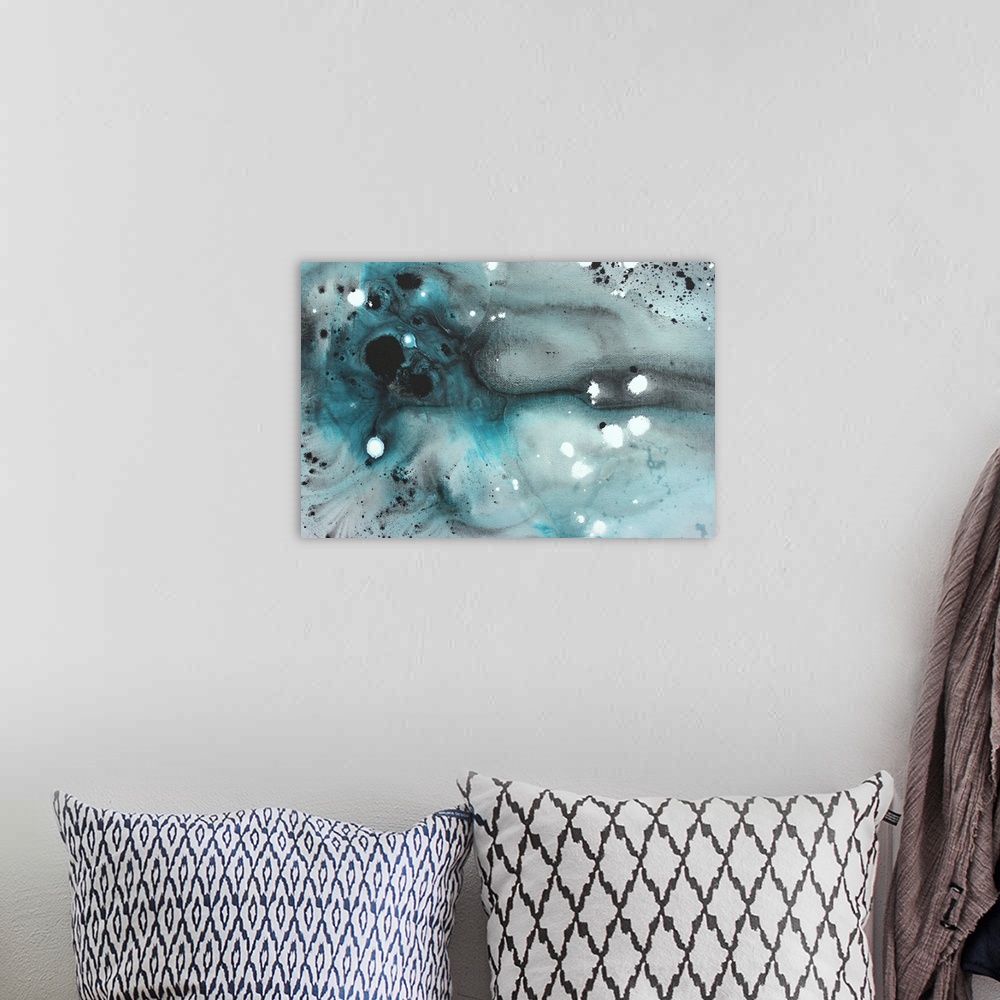 A bohemian room featuring Contemporary abstract painting of muted watercolor background with dark ink splatters.