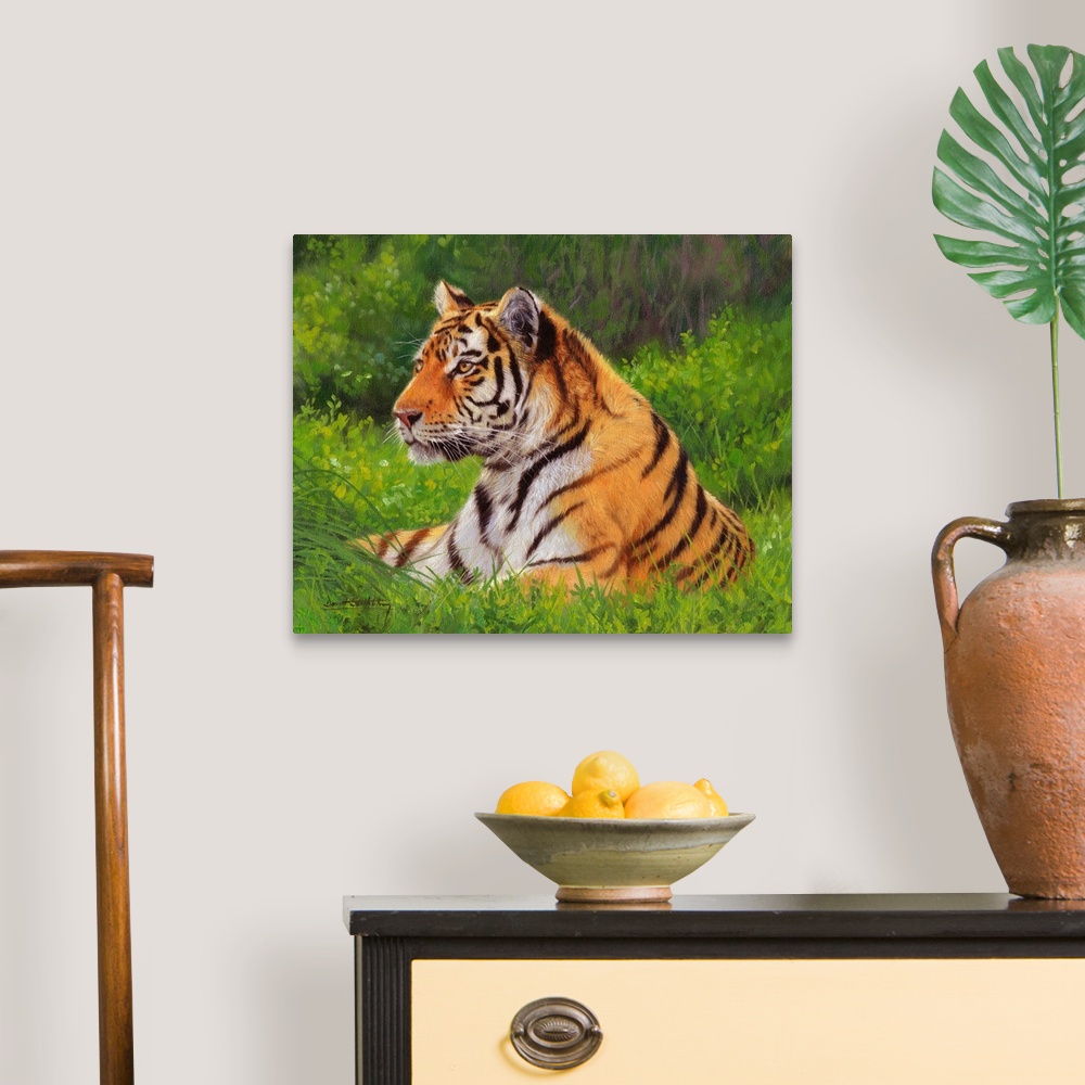 A traditional room featuring Painting of a Siberian tiger laying on the grass looking proud and majestic.