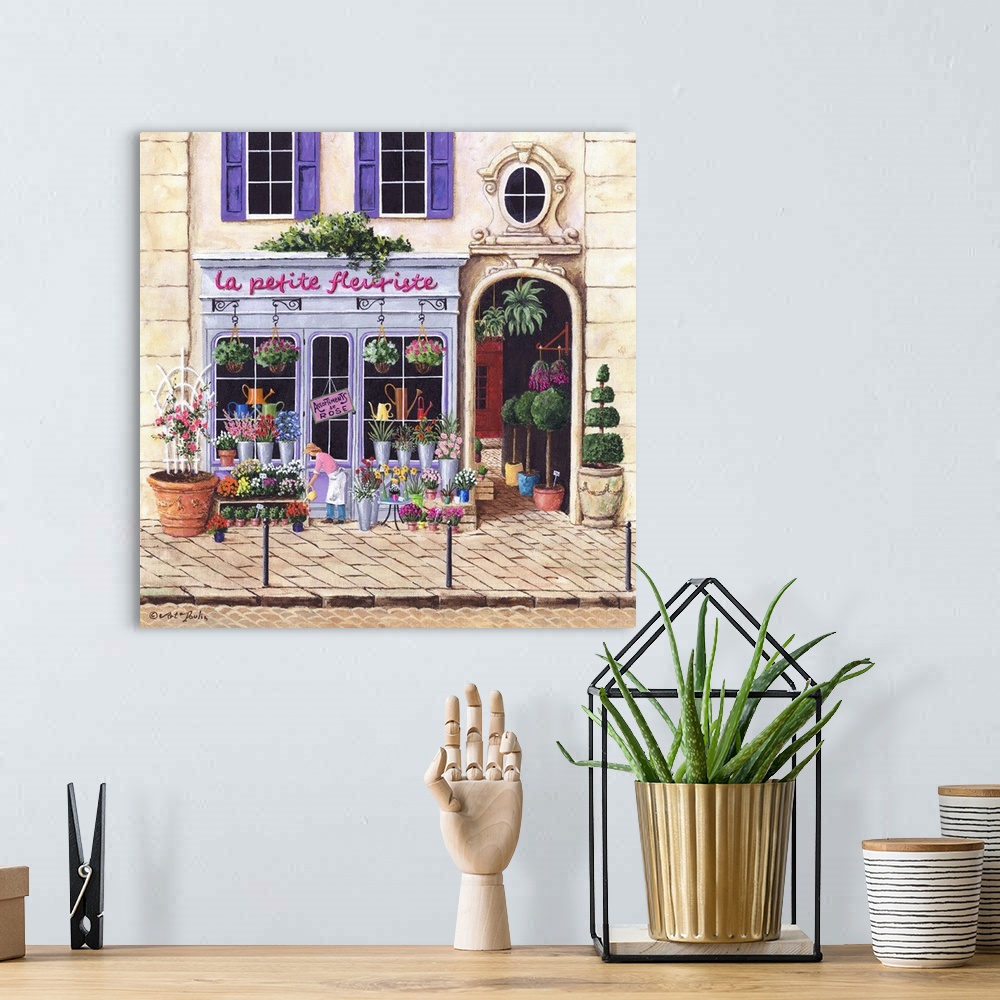 A bohemian room featuring Painting of a Parisian flower shop storefront.