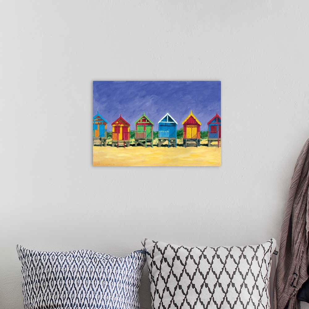 A bohemian room featuring Contemporary painting of colorful beach huts on a sandy golden beach.