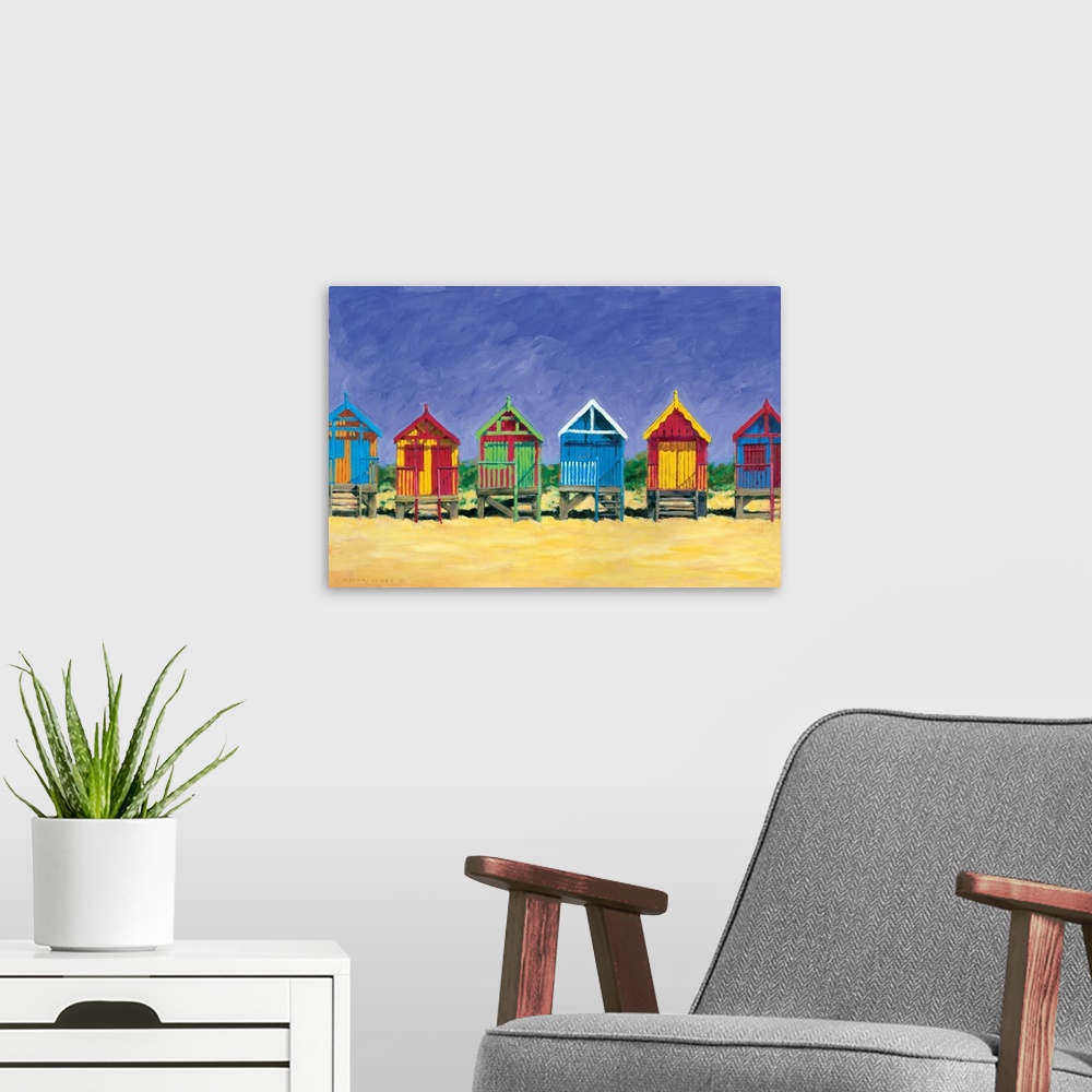 A modern room featuring Contemporary painting of colorful beach huts on a sandy golden beach.
