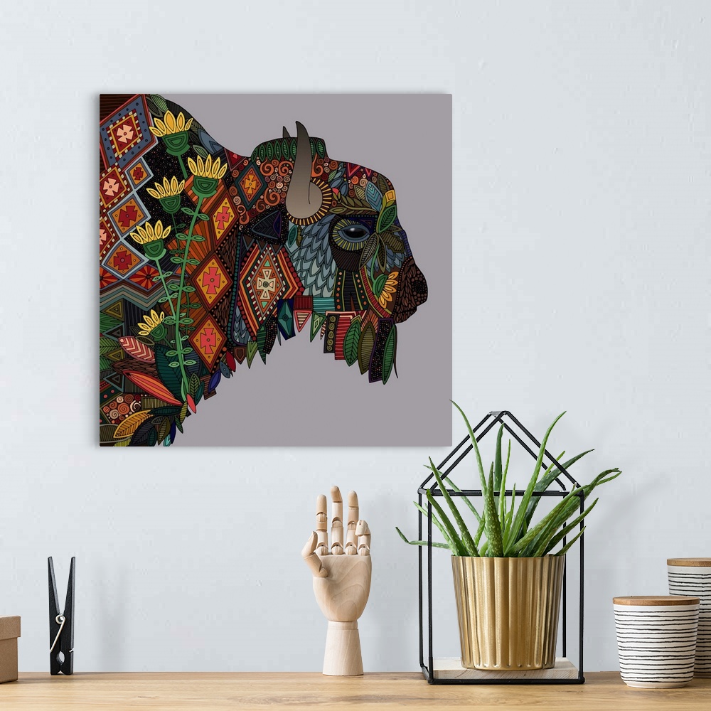 A bohemian room featuring Illustration of a buffalo with geometric patterns.